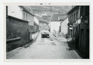 [Photograph of Truck on City Street]