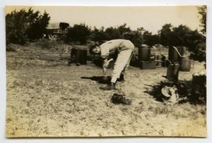 [Photograph of Soldier Washing]