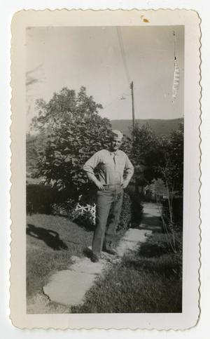 [Photograph of Soldier in Yard]