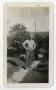 Photograph: [Photograph of Soldier in Yard]