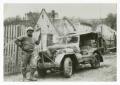 Photograph: [Photograph of Soldier and Jeep]