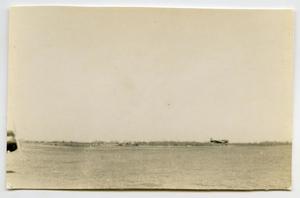 [Photograph of Airplane Takeoff]