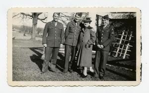 Primary view of object titled '[Photograph of Soldiers and Mrs. Moore]'.