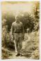 Photograph: [Photograph of Soldier in Forest]