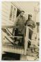 Photograph: [Photograph of Soldiers Outside Barracks]