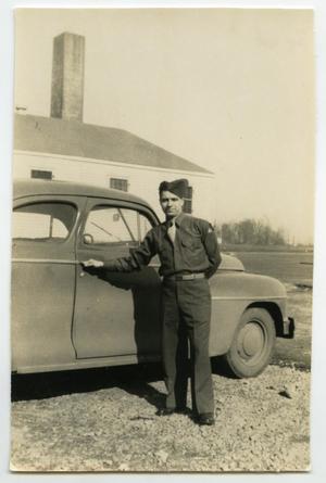 [Photograph of Henry Rohrbeck with Car]