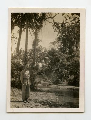 Primary view of object titled '[Photograph of Soldier in Jungle]'.