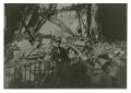 Photograph: [Photograph of Soldier in Rubble]