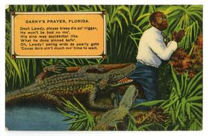 [Postcard of Man and Alligators]