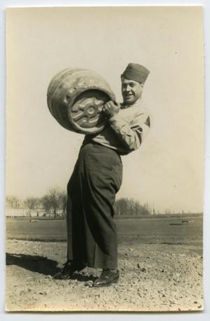Primary view of object titled '[Photograph of Henry Rohrbeck Holding Keg]'.