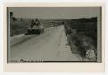 Photograph: [Photograph of Tanks on Country Road]