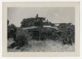 Photograph: [Photograph of Soldier on Tank]