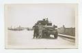 Photograph: [Photograph of Soldiers and Half-Track]