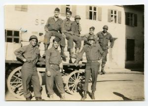 [Photograph of Soldiers Unloading Wagon]
