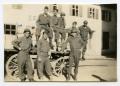 Photograph: [Photograph of Soldiers Unloading Wagon]