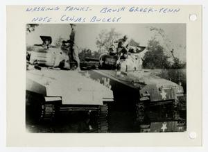 Primary view of object titled '[Photograph of Soldiers Washing Tanks]'.