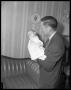 Photograph: [Man Holding Baby]