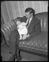 Photograph: [Man Sitting With Baby]