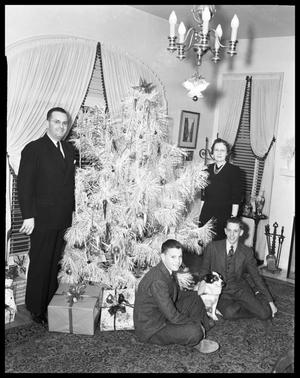 [George Betts Family Around Christmas Tree]