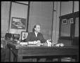 Photograph: [Marvin Hall at Desk]
