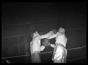 [Two Boxers in Ring]