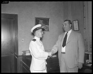 [Mayor Tom Miller and Man in Uniform]