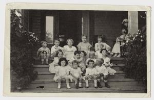 Primary view of object titled '[Children Sitting on Front Steps of a Building]'.