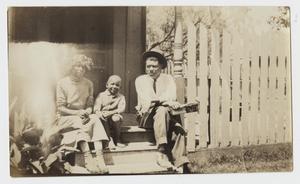 Primary view of object titled '[African American Family Sitting on Porch Steps]'.