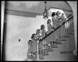 Photograph: Woman and Girls on Staircase