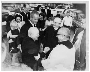 [Lyndon Johnson with Priests and Others]