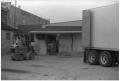 Photograph: [Truck at a Loading Dock]