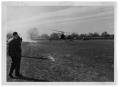 Thumbnail image of item number 1 in: '[Helicopters and Onlookers in a Field]'.