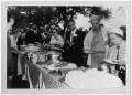 Photograph: [Lyndon Johnson in a Catered Food Line]