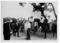 Photograph: [Lyndon Johnson and Others Standing Before a Line of Horsemen]