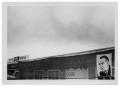 Photograph: [Lyndon Johnson Political Advertisement on the Side of a Building]