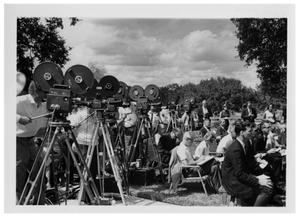 Primary view of object titled '[Film Crews and Others Seated]'.