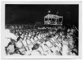 Thumbnail image of item number 1 in: '[School Band Performing Outdoors at Night]'.