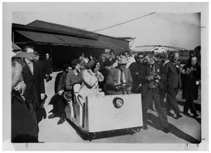 Primary view of object titled '[Lyndon Johnson Driving Through Journalists]'.