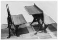 Photograph: [Two Wooden and Metal Benches]