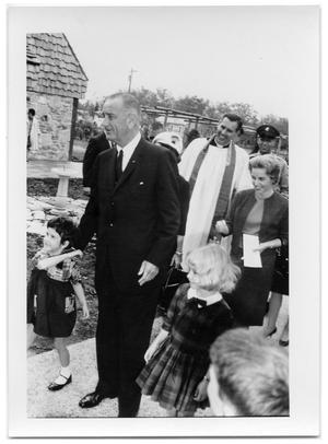 [Lyndon Johnson Posing with Children in Front of Church]