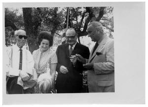 [Lady Bird and Lyndon Johnson with Two Men and a Child]