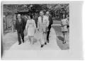 Thumbnail image of item number 1 in: '[Lady Bird and Lyndon Johnson on Sidewalk]'.