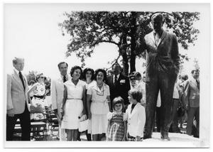 [Johnson Family and Others with Statue]