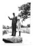 Photograph: [Woman with Statue of Lyndon Johnson]