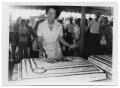Photograph: [Lady Bird Johnson Cuts a Bicentennial Cake]