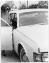 Photograph: [Lyndon Johnson and Others Getting Into a Car]