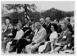 [Lyndon Johnson Sitting with Rows of People]