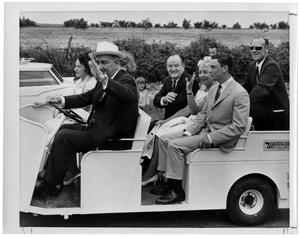 [Lyndon B. Johnson Driving a Golf Cart]