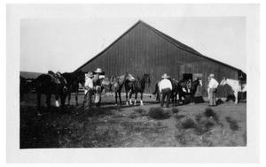 [Cowboys and Horses in front of a Barn]