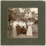 Photograph: [Six Women, One Man, and Two Babies under a Tree]